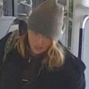Police hunt woman who pushed man onto tracks at London station