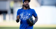 Dodgers' Justin Dean has not batted yet in the playoffs. Here's how he still contributes