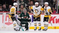 Penguins take over NHL’s top spot with win over Wild