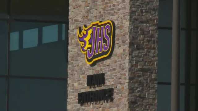 Johnston school board candidates reprimanded for violating campaign sign law