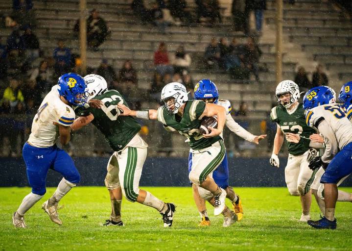 PREP FOOTBALL: Roughriders lose soggy defensive battle to Bremerton