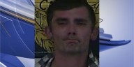 Man strikes police officer with flashlight