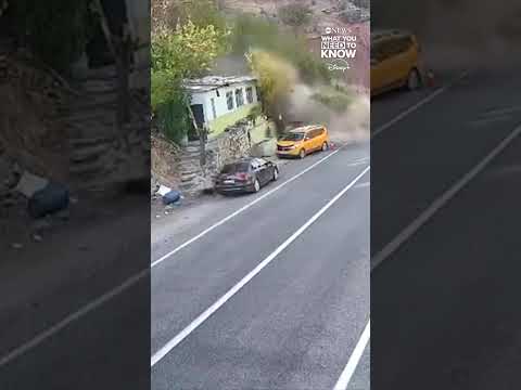 Cab driver narrowly avoids falling boulder