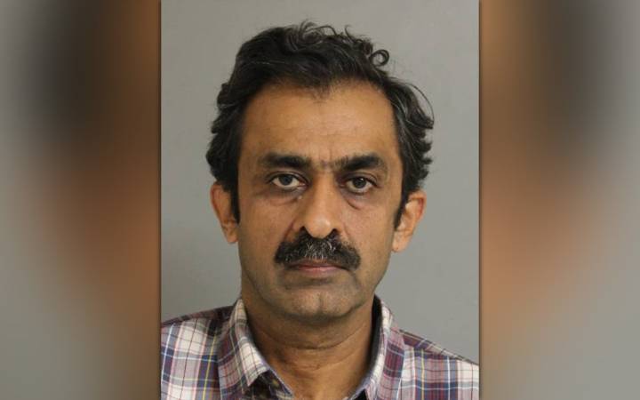 L.I. education aide charged with photographing teen in fitting room