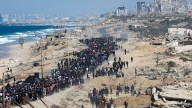 Gaza ceasefire comes into effect under Trump's first phase as thousands of Palestinians trek home