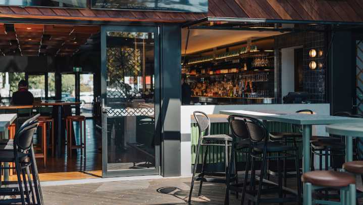 Summer heats up at Hotel Royal as the courtyard comes alive with music, spritzes, and good times