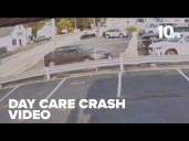 Police release video that shows moment driver smashes into day care fence