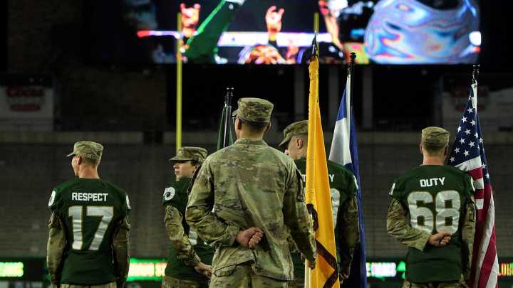 A look at the Boot Run as the ROTC runs game ball to Wyoming border