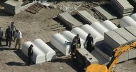 Man pinned under burial vault in Dallas dies