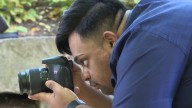 Program helps young photographer with Down syndrome start his own business