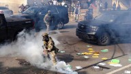 'Startled' judge orders agents in Chicago area to wear body cameras after violent clashes