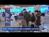 Travel troubles spread amid government shutdown