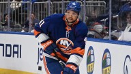 Islanders promote LIer Marshall Warren