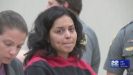 Mother and 2 others charged in death of child found in storage bin outside Connecticut home