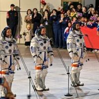 China sends youngest astronaut, mice to space station