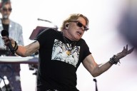 Guns N’ Roses frontman Axl Rose kicks drumset and throws mic in onstage meltdown