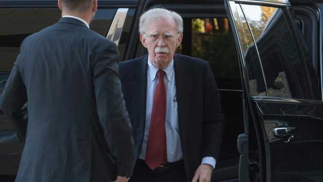 Bolton arrives at court for charges in classified information case