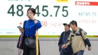 Asian stocks surge, Japan's Nikkei hits record