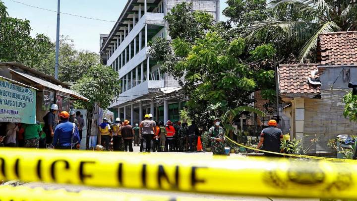 Death toll from Indonesian school collapse jumps to at least 49