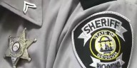 22-year-old man arrested, accused of impersonating an officer