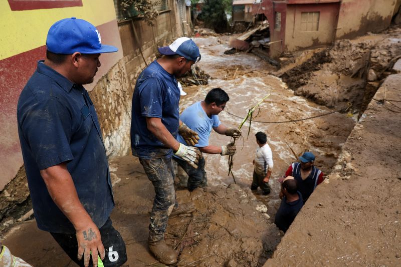 Heavy rains flood Mexico towns, leave nearly 130 dead or missing