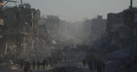 Palestinians return to ruins as aid groups push to scale up deliveries and US troops land in Israel