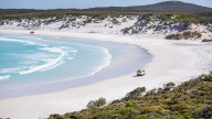 Family discovers 109-year-old message in bottle after it washes ashore on Esperance beach