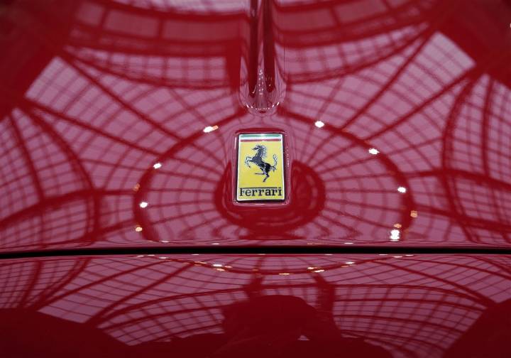 Ferrari reveals features of first fully electric vehicle, raises 2026 forecasts