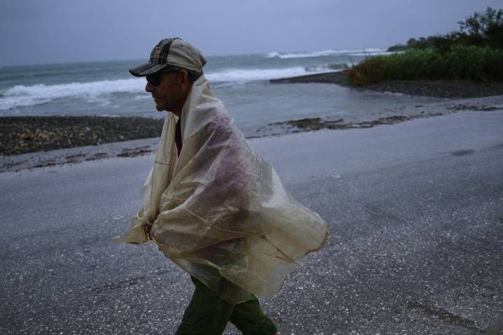 The Latest: Hundreds of thousands evacuate as Hurricane Melissa hits eastern Cuba