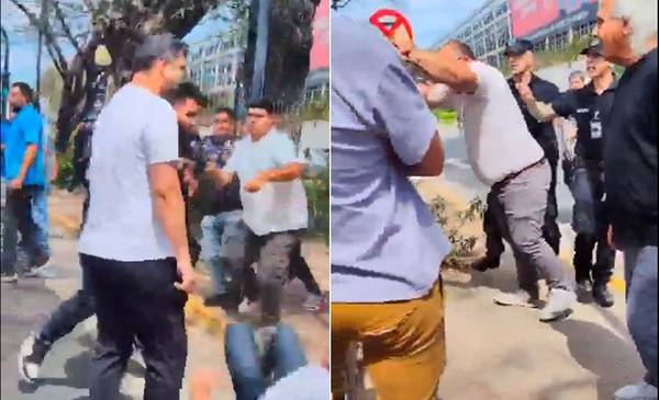 VIDEO. ¡Todos a las manos! Choferes de aplicación y taxistas a las piñas en Aeroparque