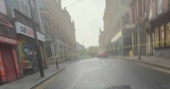 Police tape off Northern Quarter street with man rushed to hospital