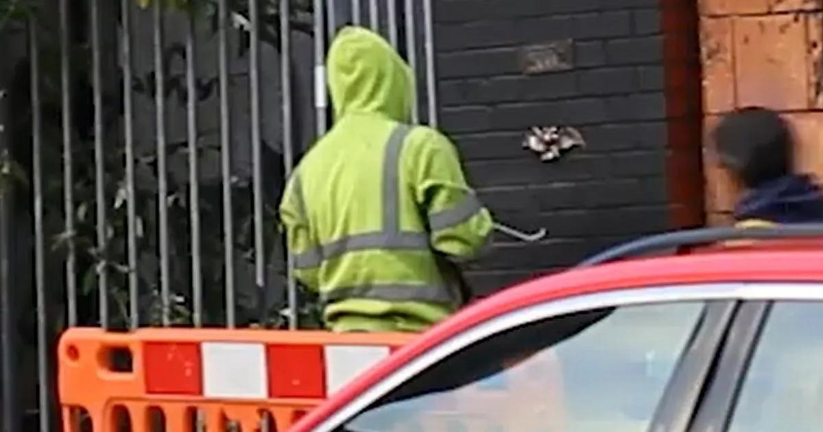 Watch mystery man in high-vis drill 'Ozzy Osbourne bat' by Crown Pub in secret stunt