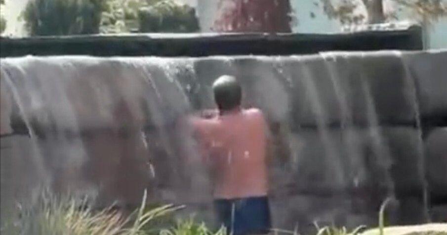 Video shows man showering in waterfall display outside Niagara Falls city hall