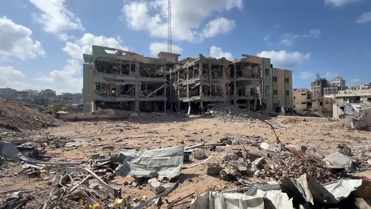 People living in Gaza assess damage to key hospital as ceasefire holds