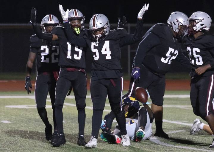 Photos of Hazel Park vs. Detroit East English Village Prep in football action