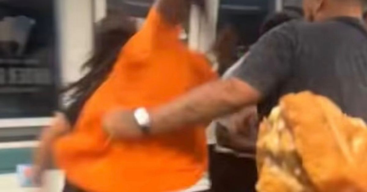 Mass brawl inside burger chain after food order mix-up as floors left bloodstained