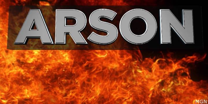 Woman set front door on fire to ‘get back’ at upstairs neighbor, police say