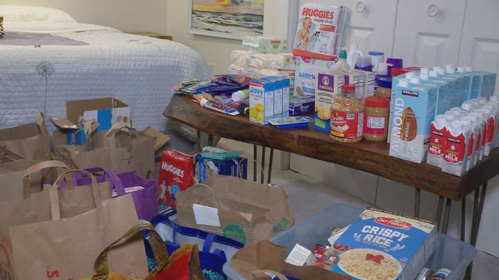 Grand Rapids neighbor hands out groceries AND candy to trick