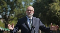 As the shutdown drags on, the threat of permanent cuts is mired in politics
