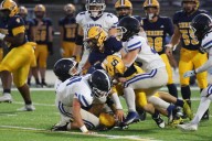 Shrine beats Our Lady of the Lakes 28-14 to stay in league race