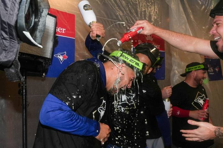 ‘We’re coming home, Toronto’: Blue Jays celebrate first ALDS win since 2016