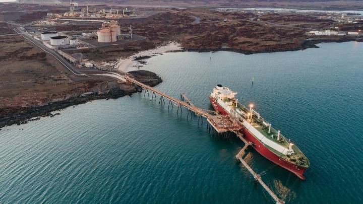 Energy 
                                              Premium
                                            Woodside lifts full