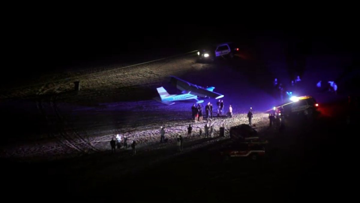 Small plane makes emergency landing on shore in Huntington Beach