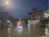 Inundaciones asociadas a tormenta detienen tráfico en Santo Domingo