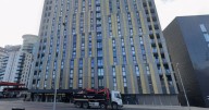 Man rushed to hospital after 'falling from balcony' near city centre