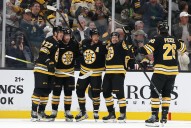 Bruins shake slow start, dump Islanders
