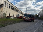 East Providence firefighters battle commercial structure fire