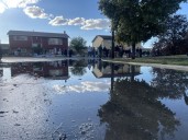 'Water is all the way to our knees'; Rose Park homeowners clean up after flooding