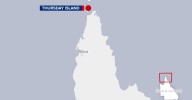 Thursday Island shark attack: Teenage boy figthing for life after being bitten on the stomach in Queensland
