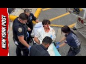 Bloodied Staten Island Decapitation Suspect Removed From Precinct on a Gurney